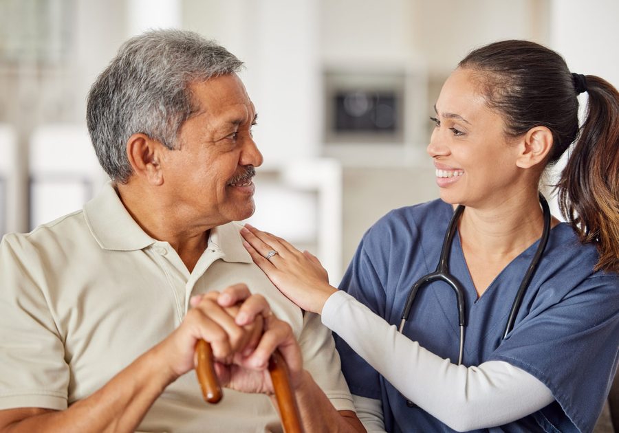 Illustrative scene of a clinician speaking with an older adult